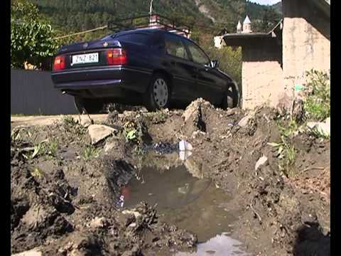 დაზიანებული ხიდი და გზა ახალ უბანში