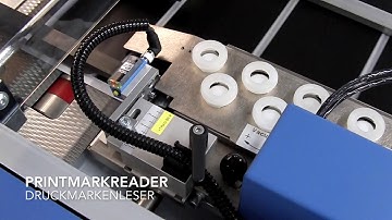 Bograma BSR 550 producing playing cards with square corners delivering to a cassette