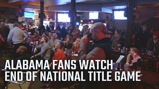 Alabama fans watch the end of the 2017 National Championship game