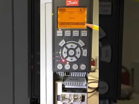 Generating alarms for commissioning on Danfoss VFDs