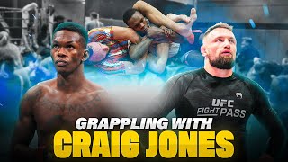 Israel Adesanya Grapples with Craig Jones &amp; Attends Local MMA Fight Night