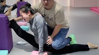 The pretty girls had dance flexibility training and it really hurt quite a bit