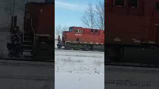 Race with mixed freight train CP ES44AH 8930 + UP ES44AC 5361