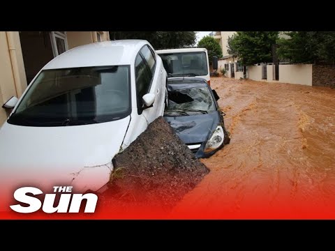 Flash floods sweep cars into the sea in Crete as people left stranded on rooftops