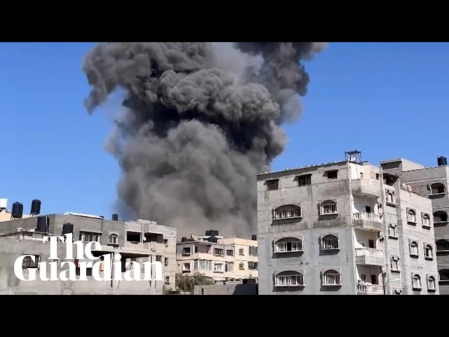 Footage captures the moment of an airstrike from inside a nearby building class=