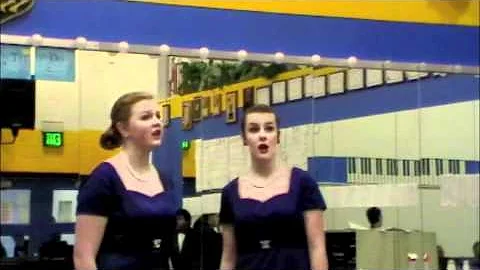 Emily and Kyleigh singing The Snow Begins to Fall by Andy Beck