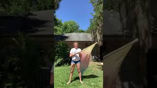 Parallel toss behind the back on flag