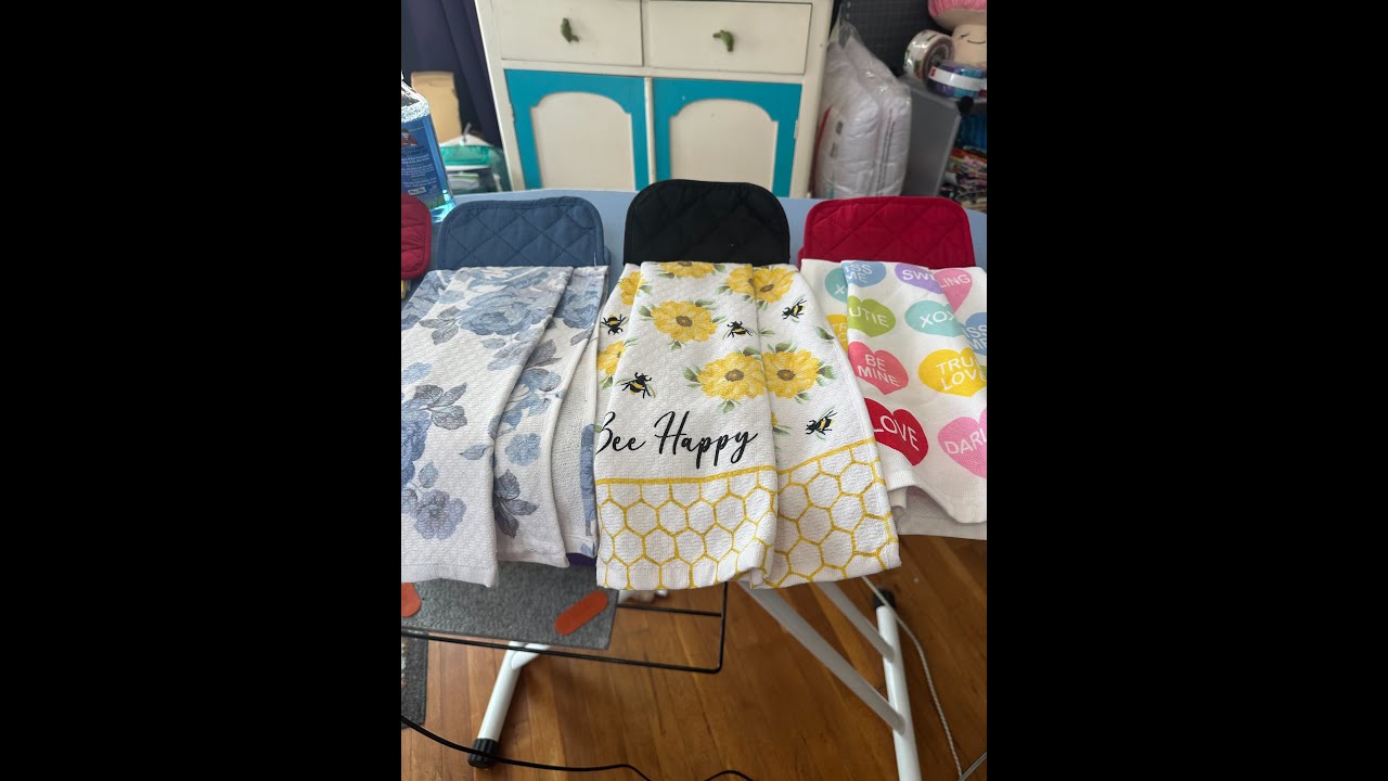 Quick and Easy T-Towel using a pot holder.