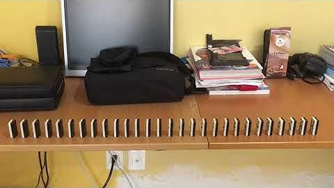 Uniform linear motion with dominos