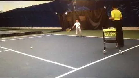 Barry Balthrop teaching Tennis with Matthew Tran o...