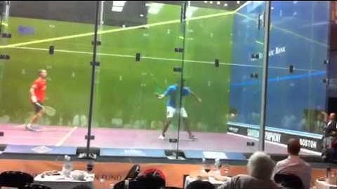 ramy ashour hits with his racket handle.MOV