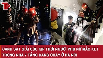 Cảnh sát giải cứu kịp thời người phụ nữ mắc kẹt trong nhà 7 tầng đang cháy ở Hà Nội