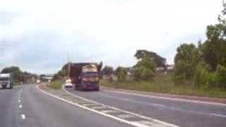 DUMP TRUCK CAT 777D  ON MOTORWAY