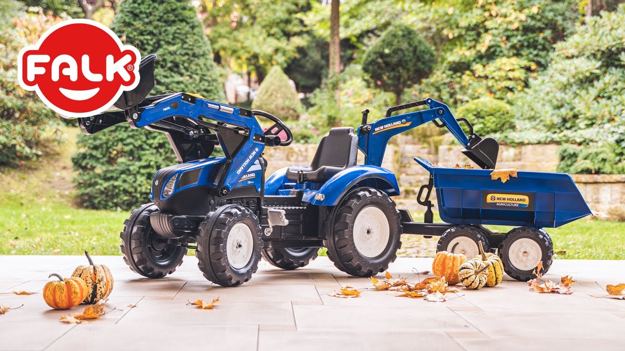 Trator a pedais Kubota M135GX com pa, excavadeira e reboque basculante