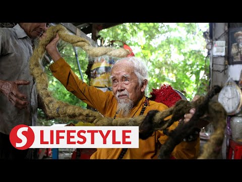 "Divine calling" inspires Vietnam man to grow 5-metre dreadlock