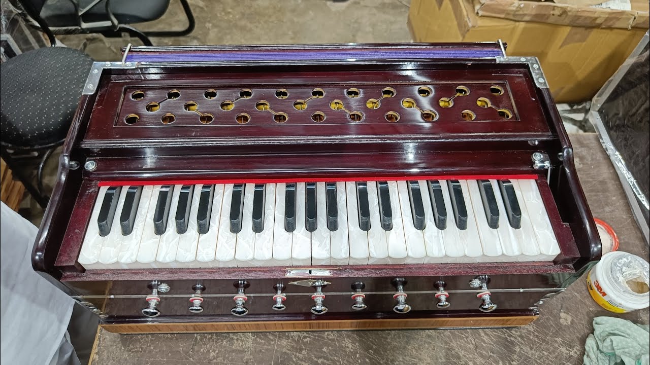 Wholesale rates harmonium 3.5 octaves 9 stopper standard 42 keys two line coupler mahagony color