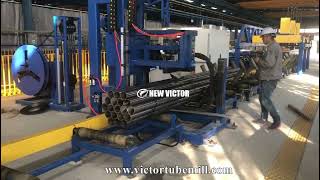 auto packing machine for steel pipes of ERW tube mill after auto stacking and bundling