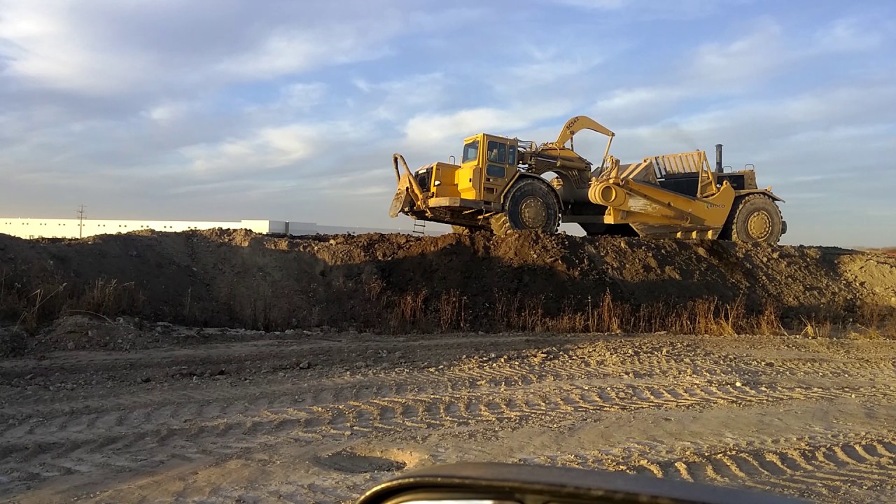 Keep your bulldozer...627G builds its own ramp - YouTube