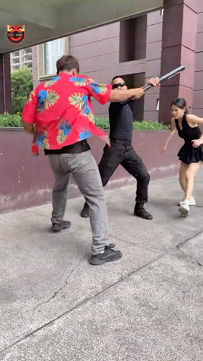 The bodyguard protects the female owner. 293