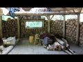 off grid roundhouse build part 20 solar panels, cordwood walls, garden update