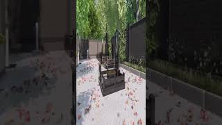 Комбинированный памятник из светлого мрамора и черного гранита с цветником и вазой