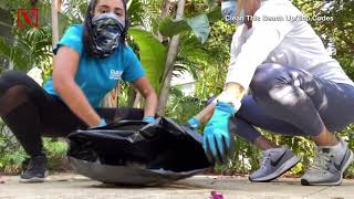 Woman Shows Litter Caused by Discarded PPE on Miami Streets Resimi