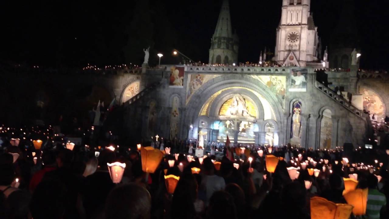 Salve regina lourdes procession candles - YouTube
