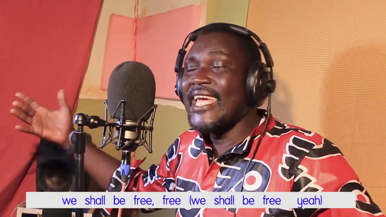 WE SHALL BE FREE BY AMBROSE LUCKY O