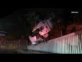 Big rig loses control in the rain and crashes over the side of the freeway in Los Angeles, Ca.