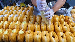 Cream filling in homemade donuts / Korean street food