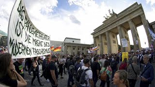 Koronavírus: Európa nagyvárosaiban tüntettek a maszkviselés ellen