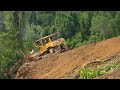 Desperate action of cat d6r xl bulldozer operators working on landslideprone mountains