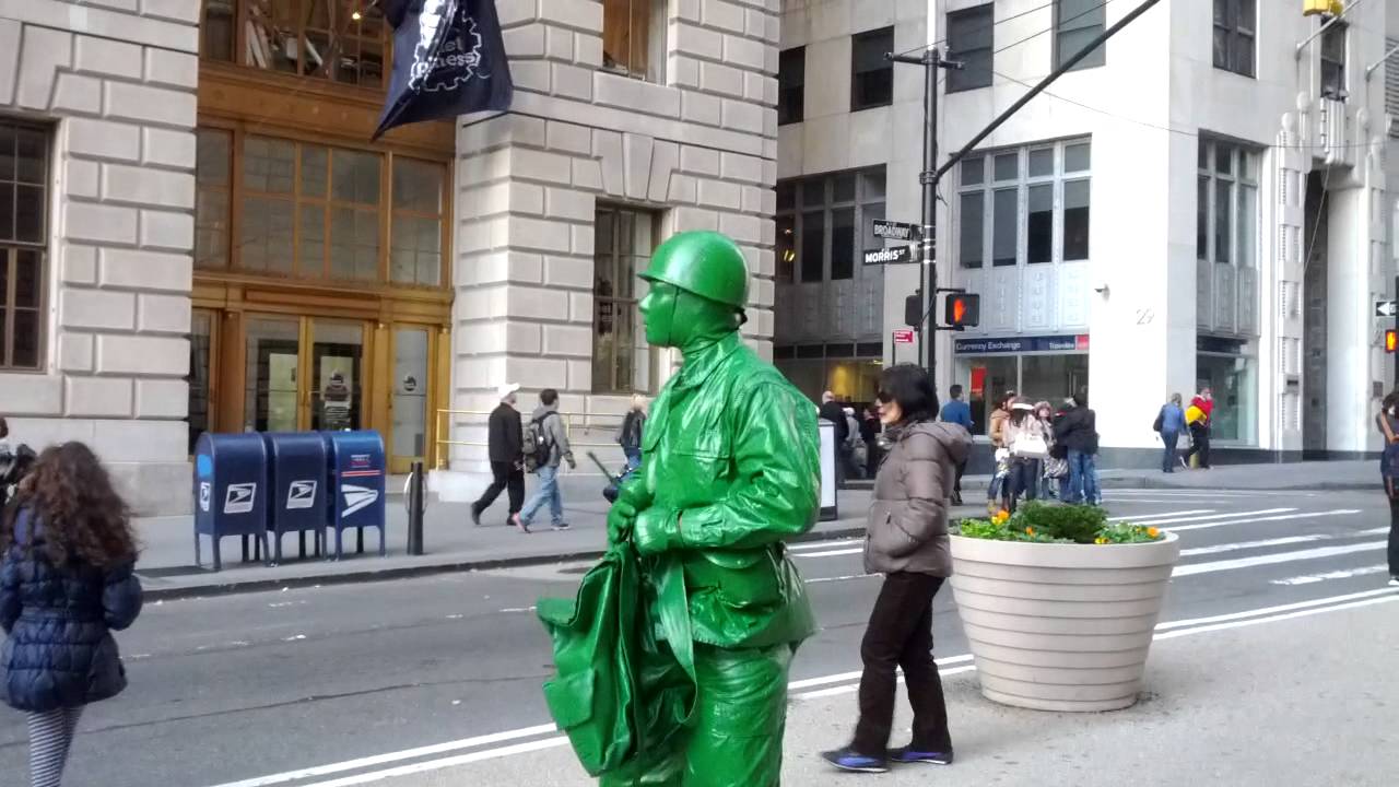 Toy Soldier Street Performer Next to the Bull of Wall Street on ...