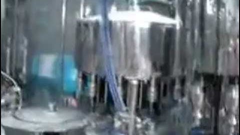 Dây chuyền máy xúc rửa chiết rót đóng chai nước tinh khiết tự động-0905967925