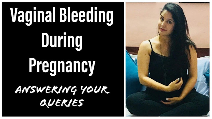 What percentage of women experience implantation bleeding