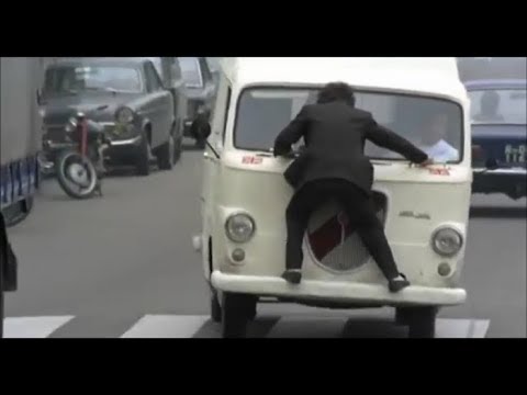 Man takes hellride on front bumper