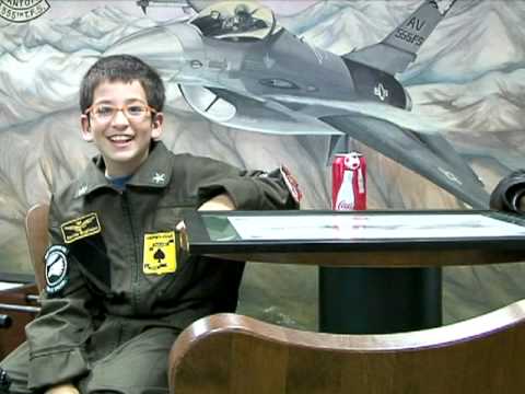 Italian boy becomes honorary pilot for the day wit...