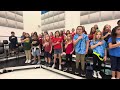 Parker Advanced Chorus rehearsing the National Anthem for the Rockets game