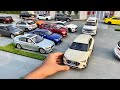 My diecast model car collection parked at miniature parking lot