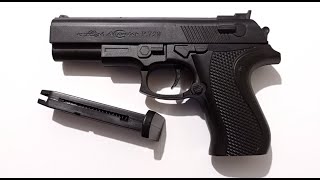 Pistola Airsoft Beretta Cougar con sistema de Balines de plástico duro y con cargador para 8 balines