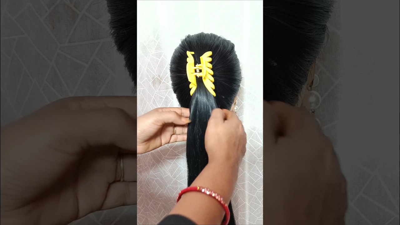 Simple And Easy Twisted Bun Hairstyle With Clutcher #clutcherhairstyle #ytshorts #viralshort #shorts