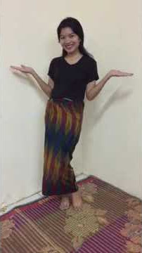 Cara memakai abit ( sarung wanita Karo )