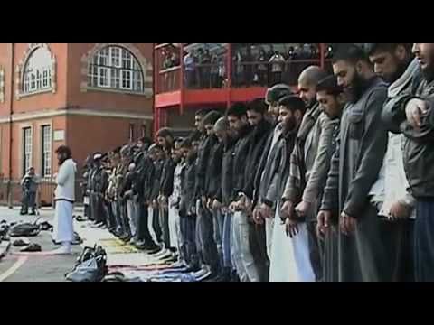 Some Muslim students at City University in London are praying in the street in a row over prayer room facilities.