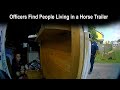 Officers Find People Living in a Horse Trailer