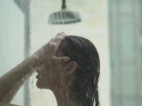 Bikini girl taking a shower