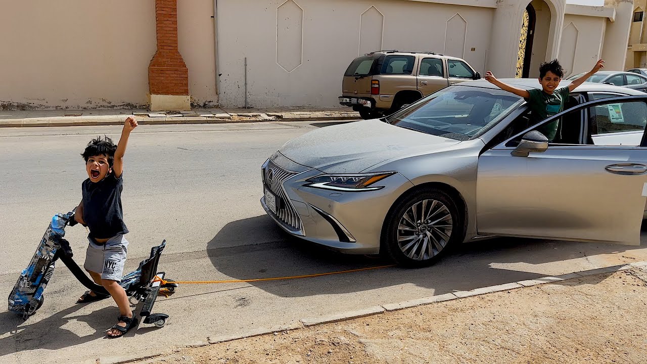 الياس ونواف يسحبون السياره بالسكوتر السريع !!
