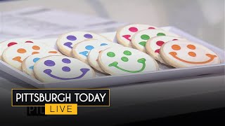 Putting our icing talents to the test with the iconic Smiley Cookie