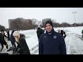 Soccer team shovels practice field