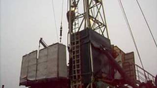 Workover Rig pulling-out a production string