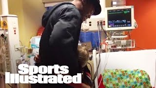 Cam Newton Grants Holiday Wish For Young Fan Battling Heart Condition I SI Wire | Sports Illustrated